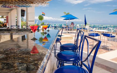bar blue chairs resort by the sea puerto vallarta