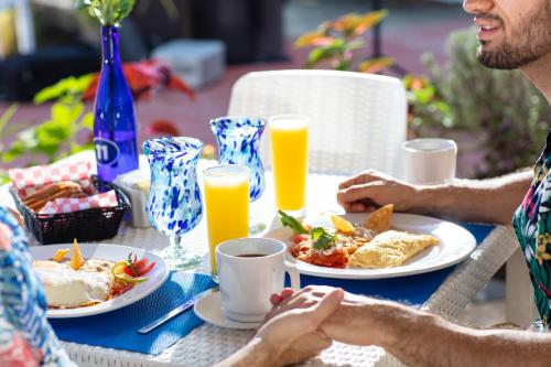 breakfast blue chairs resort by the sea puerto vallarta